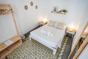Postel nebo postele na pokoji v ubytování Casa de la Alegría