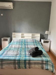 Postelja oz. postelje v sobi nastanitve Apartment Tamarinier Complexe