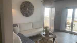 A seating area at Sohoros Luxury Suites