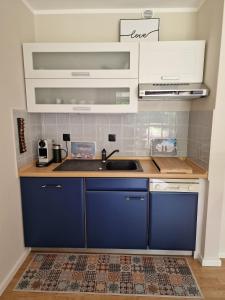 Kuchyň nebo kuchyňský kout v ubytování Ferienwohnung Frau Hansen