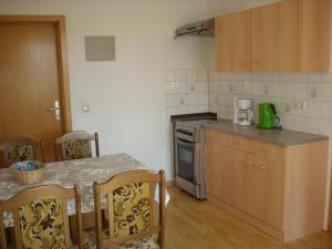Kuchyň nebo kuchyňský kout v ubytování Ferienwohnung Barthel