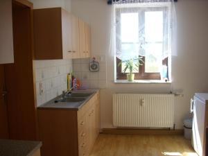 Kuchyň nebo kuchyňský kout v ubytování Ferienwohnung Barthel