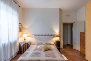 Ένα ή περισσότερα κρεβάτια σε δωμάτιο στο Le Anfore di Arpi +11 φωτογραφίες