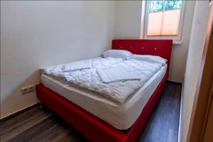 Ένα ή περισσότερα κρεβάτια σε δωμάτιο στο F-1108 Häuser Prosnitz Haus08 Terrasse, Gartennutzung