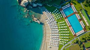 an overhead view of a group of buildings next to the water at Maxx Royal Kemer Resort in Kemer