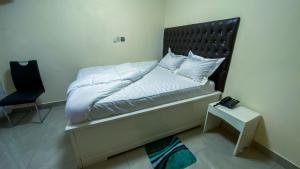 Postel nebo postele na pokoji v ubytování HELEN Hotel