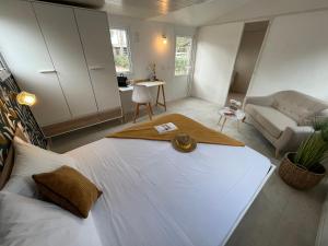 Postel nebo postele na pokoji v ubytování Camping Le Calypso 5 étoiles