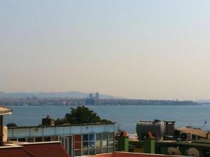 a view of the water from the roofs of buildings at Timeks Suite Sultanahmet in Istanbul