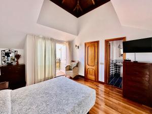 Postel nebo postele na pokoji v ubytování Villa Sara y Sebas + 15 fotografií