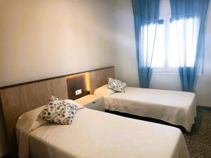 Posteľ alebo postele v izbe v ubytovaní Villa Service - Igualada
