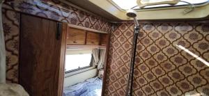 an interior view of an rv with a window at Van with 3 double bed, nice and quite place, to 500m beatufill beach in Adeje