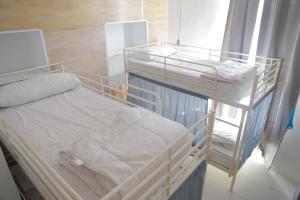 A bed or beds in a room at Terraza del Limonar