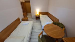 Postel nebo postele na pokoji v ubytování Zacisze Natura Tour