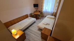 Postel nebo postele na pokoji v ubytování Zacisze Natura Tour