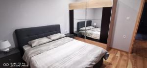 Ένα ή περισσότερα κρεβάτια σε δωμάτιο στο Θα νιώθετε σαν στο σπίτι σας!