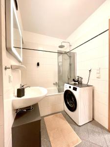 Ванная комната в Sunshine City Apartment - Leipzig Zentrum - Parkplatz - Netflix