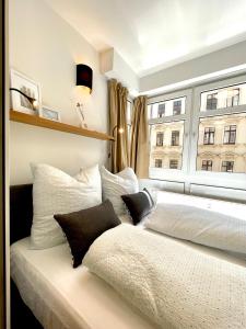 Кровать или кровати в номере Sunshine City Apartment - Leipzig Zentrum - Parkplatz - Netflix