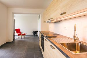 Kuchyň nebo kuchyňský kout v ubytování Apartmány Pěkná 10