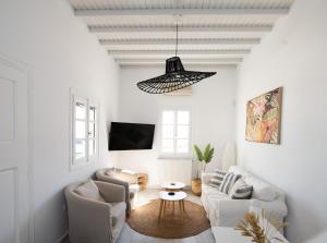 TV a/nebo společenská místnost v ubytování Sunny Villa Roselani