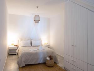 Postel nebo postele na pokoji v ubytování Sunny Villa Roselani