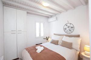 Postel nebo postele na pokoji v ubytování Sunny Villa Roselani
