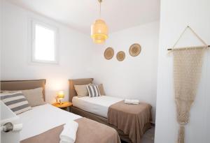 Postel nebo postele na pokoji v ubytování Sunny Villa Roselani