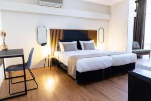 Llit o llits en una habitació de Frankendael Apartments