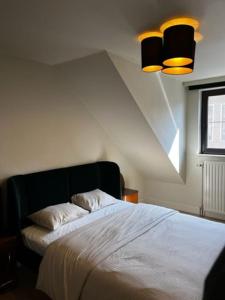 Llit o llits en una habitació de Appartement Parkzicht