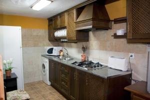 Kuchyň nebo kuchyňský kout v ubytování Apartamento Orán 1