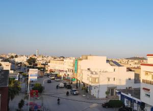 an overhead view of a city street with buildings at DarAttiaKelibia in Kelibia