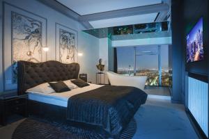 Posteľ alebo postele v izbe v ubytovaní In The Sky - Apartamenty w Sky Tower