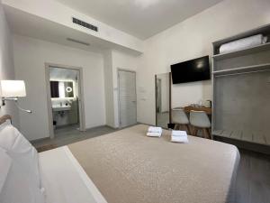 TV a/nebo společenská místnost v ubytování Hotel Ester