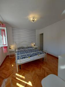Postel nebo postele na pokoji v ubytování Kuća Luce-soba br.3