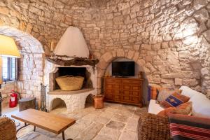 Imagem da galeria de Trullo La Vecchia Elce with garden em Locorotondo