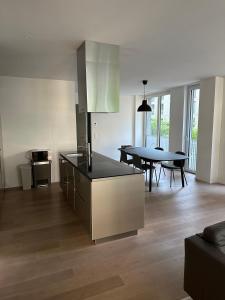 Köök või kööginurk majutusasutuses Wohnung im Trendquartier zentral - 24-7 check-in with keybox