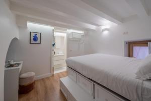 Posteľ alebo postele v izbe v ubytovaní RELSTAY - Brera District + 37 fotografií