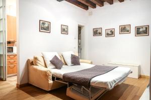 Кровать или кровати в номере Mela Luxury Venice Apartments