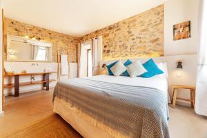 Postel nebo postele na pokoji v ubytování Ōrigins Hotel Boutique - Adults Only