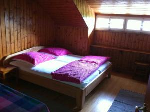 Postel nebo postele na pokoji v ubytování Eckhäusle