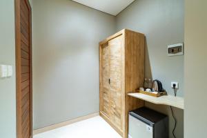 Kuchyň nebo kuchyňský kout v ubytování Narada Suite & Villa