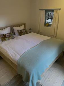 Ένα ή περισσότερα κρεβάτια σε δωμάτιο στο Rustico Leoro