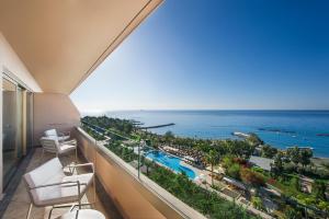 a hotel room with a view of the ocean at Four Seasons Hotel in Limassol