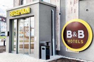 a building with a b b hotel sign on it at B&B Hotel Rostock City-West in Rostock