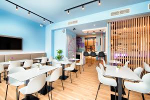 TV a/nebo společenská místnost v ubytování B&B Hotel Wien-Meidling