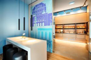Kuchyň nebo kuchyňský kout v ubytování B&B Hotel Wien-Meidling