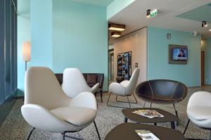 TV a/nebo společenská místnost v ubytování B&B Hotel Wien-Hbf