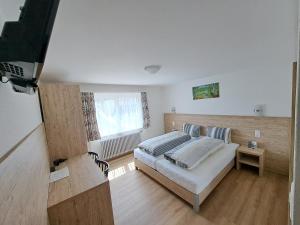 Postel nebo postele na pokoji v ubytování Hotel Posta + 36 fotografií