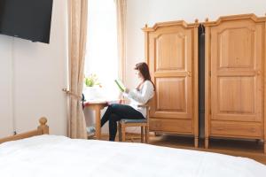 Postel nebo postele na pokoji v ubytování Seminarzentrum Stift Schlägl