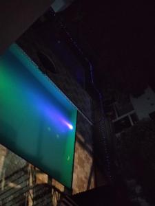 a close up of a television screen at night at Naru in Utica