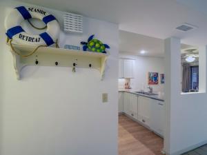 a kitchen with a beach ball and a life preserver at 2780 Live Oak Villa in Seabrook Island
